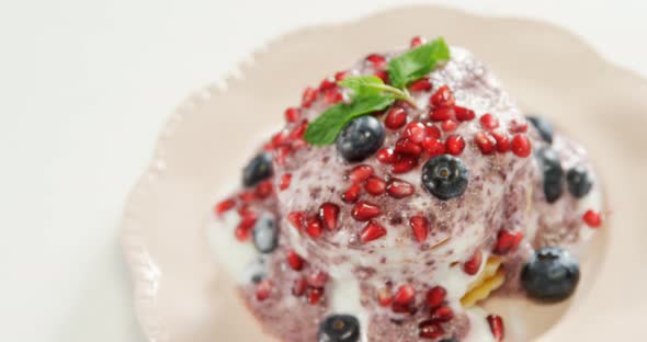 Waffle ice cream garnish with fruits placed on plate 4K 4k