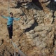 A Young Woman Is on the Slackline at High Altitude - VideoHive Item for Sale