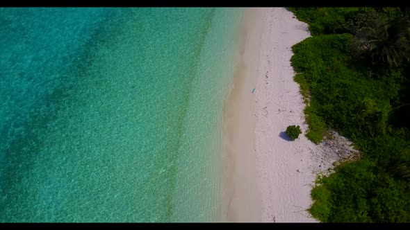 Aerial landscape of tranquil sea view beach adventure by shallow ocean with white sandy background o