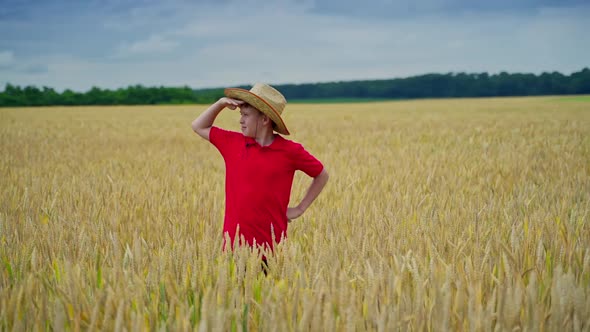 Little agronomist on a field