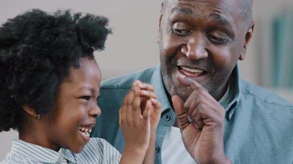 Closeup Happy African American Family Mature Father and Little Daughter Spend Free Time Together