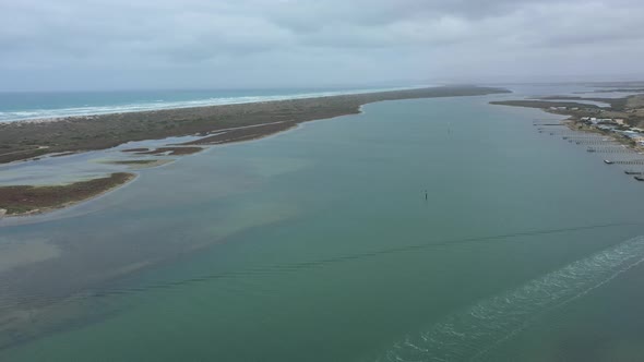 Aerial footage of a sand dredger at the mouth of the River Murray in South Australia