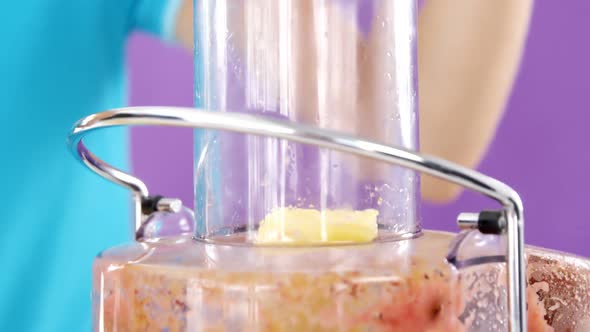 Woman preparing smoothie