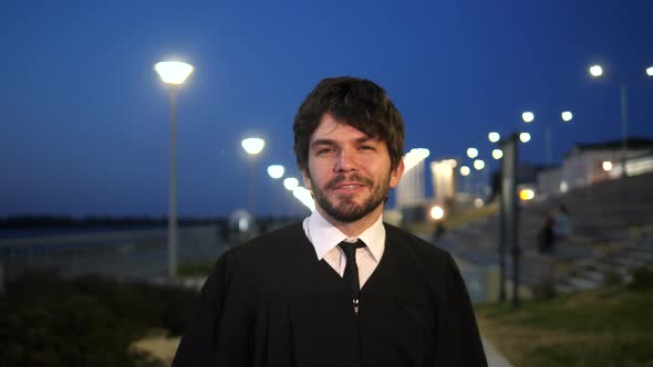 Man Walking After the Graduation Ceremony