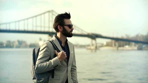 Businessman Relaxing And Walking After Work. Businessman In Suit Stroll On City Beach.