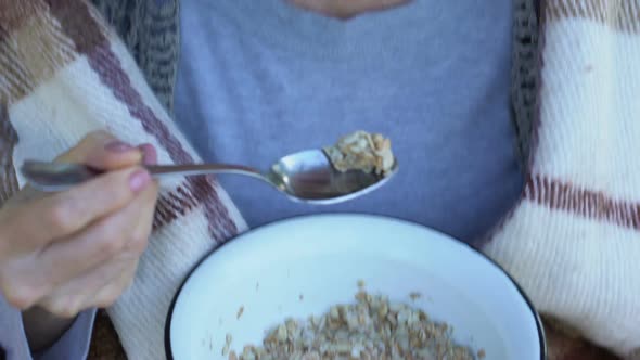 Pensive Woman With Difficulty Eating Oatmeal Porridge, Poor Social Protection