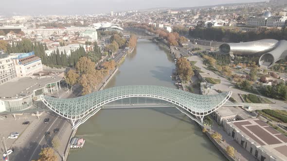 Aerial view of Tbilisi city central park and Bridge of Peace