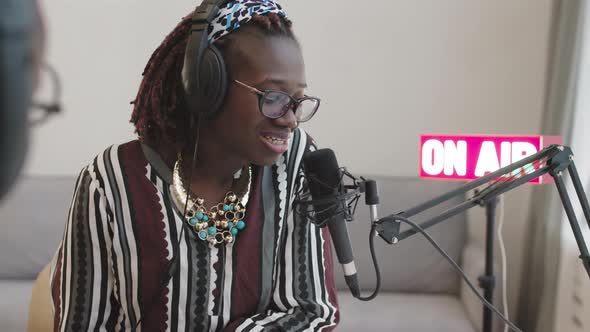 African Woman Singing during Live Radio Show