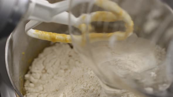 Mixing ingredients with electric mixer alt