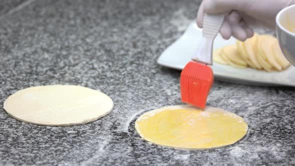 Smearing Honey Round Dough