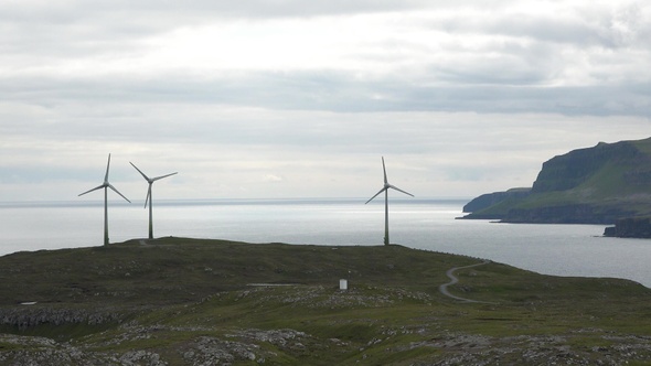 Environment friendly concept. Electrical windmill or wind turbine with rotating blades. Denmark.