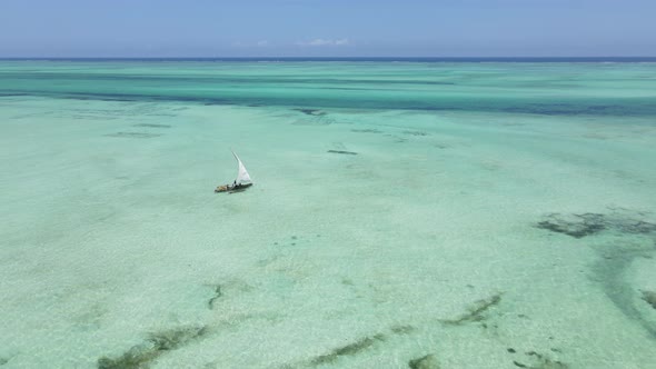 Aerial View of a Boat in the Ocean Near the Coast of Zanzibar Tanzania