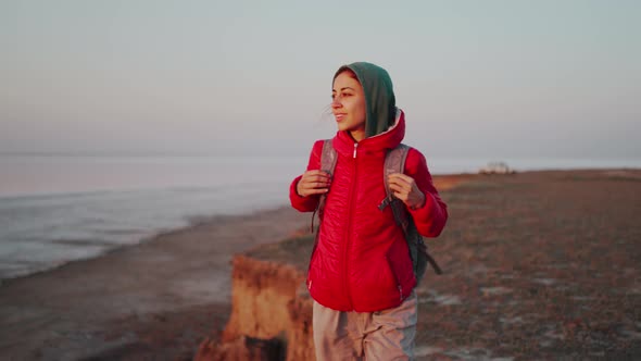 Attractive Middle Aged Happy Woman Walking Along Incredible Golden Sunset Sea Beach