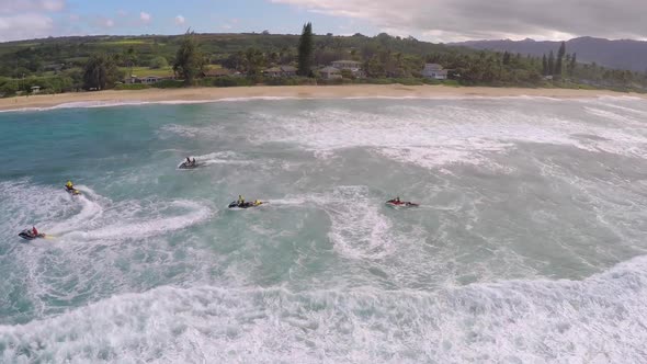 Aerial view of lifeguard surf rescue jet ski personal watercraft in Hawaii