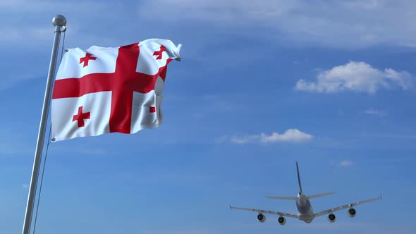 Airplane Flies Over Waving Flag of Georgia alt