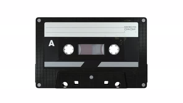 Audio Cassette Tape Spin on a White Background. Alpha Channel Included