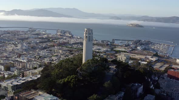 Aerial, San Francisco Coit Tower and cityscape, panning right drone 02.