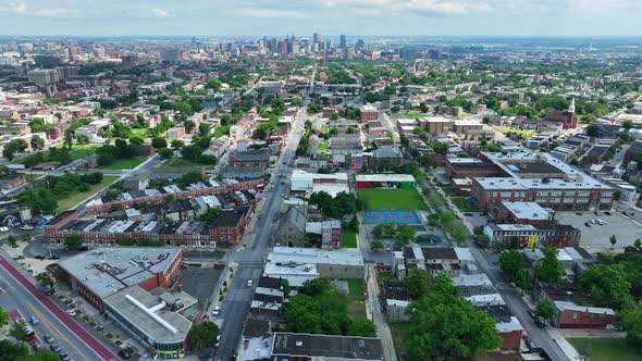 Urban American city lifestyle housing and homes truck shot. Downtown skyline in distance.