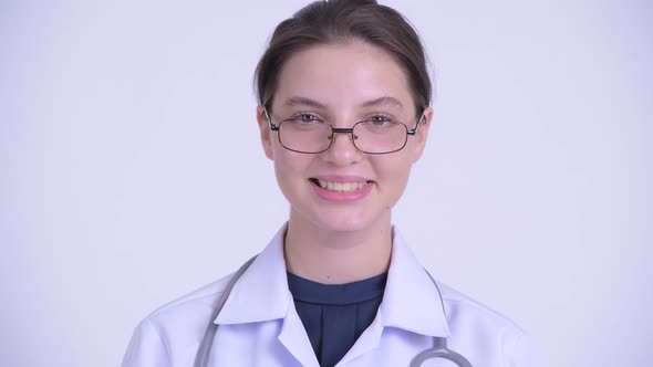 Face of Happy Young Beautiful Woman Doctor Smiling