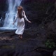 Young beautiful sexy woman in long white dress go to waterfall Tad Yuang, Laos Asia, Travel, 4K Slow - VideoHive Item for Sale