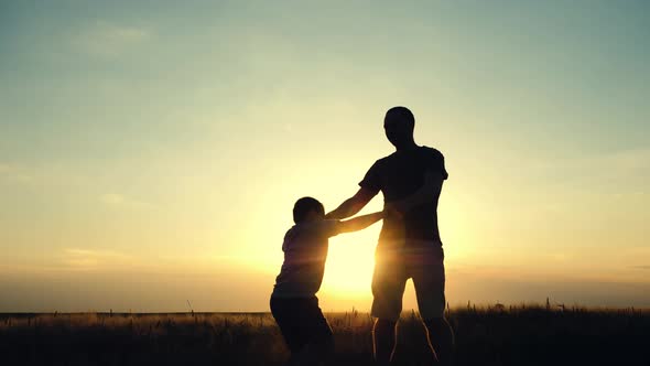 silhouette of a happy family and happy time sunset