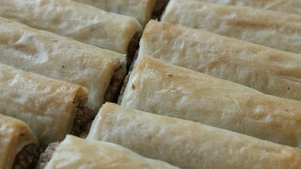 Phyllo pie baklawa with walnuts slow pan 4K 2160p 30fps UHD   footage - Sweet baklava  dessert  filo