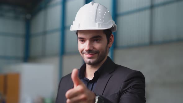 Businessman or Factory Manager Give Thumb Up