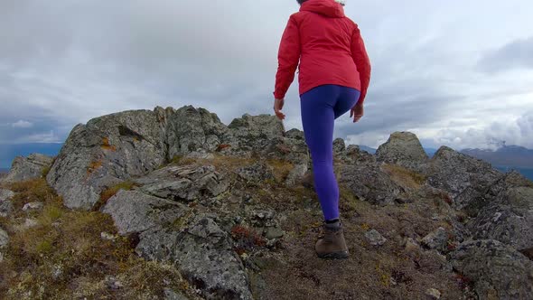 Adventurous Girl Hiking Up Nares Mountain