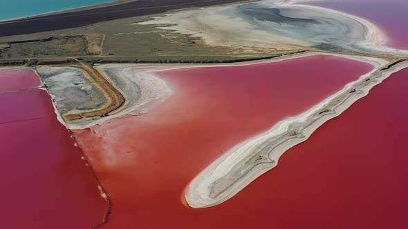 Beautiful top view of the salty, pink lake. Beautiful pink sunrise.