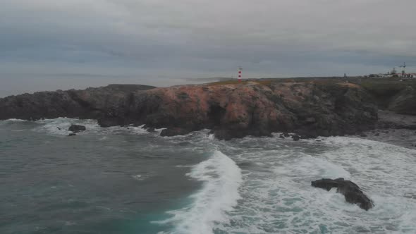 Over the Hill With Lighthouse