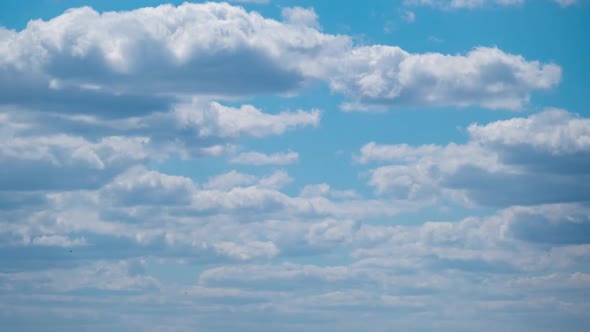 Cumulus Cirrus Clouds Move in the Blue Sky. Time Lapse.