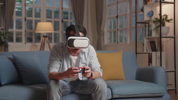 Young Man Gamer Take Off The VR Headsets When Game Is Over, Feeling Disappointed