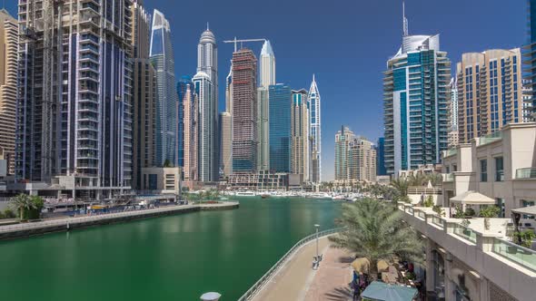 Panoramic View with Modern Skyscrapers and Yachts of Dubai Marina Timelapse Hyperlapse United Arab