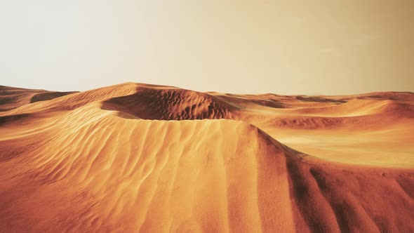Sunset Over the Sand Dunes in the Desert
