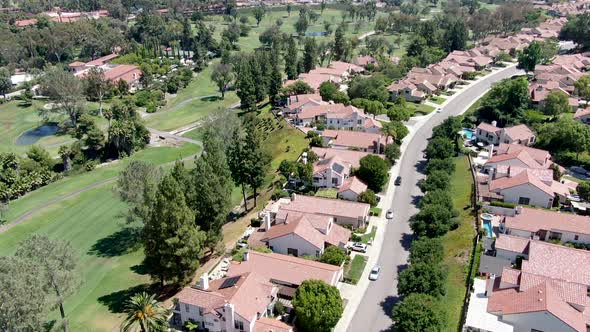 Aerial View of Residential Neighborhood Surrounded By Golf in Green Valley