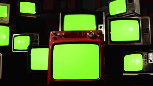 Pile of Retro TVs turning on Green Screens with Color Bars. Zoom Into Green Screen. 4K.