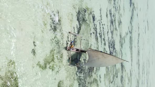 Tanzania Vertical Video  Boat Boats in the Ocean Near the Coast of Zanzibar Aerial View