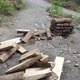 View of wooden logs, piled up alongside the road and ready to be sold - VideoHive Item for Sale