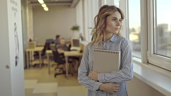 Happy Accountant Woman Posing for Photo and Smiling Standing in Office Room