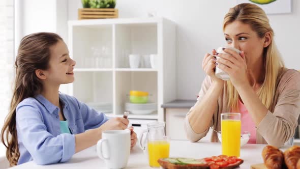 Happy Family Having Breakfast at Home Kitchen 39