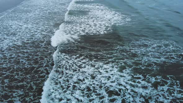 Amazing Flight Over an Endless Beach in the Evening