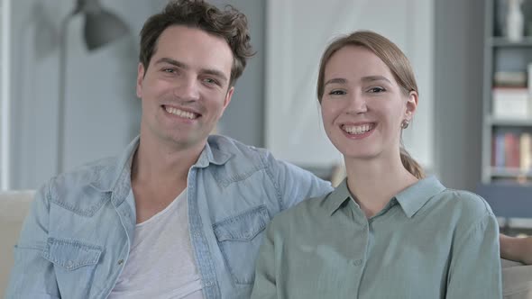 Portrait of Happy Couple Smiling and Looking at the Camera