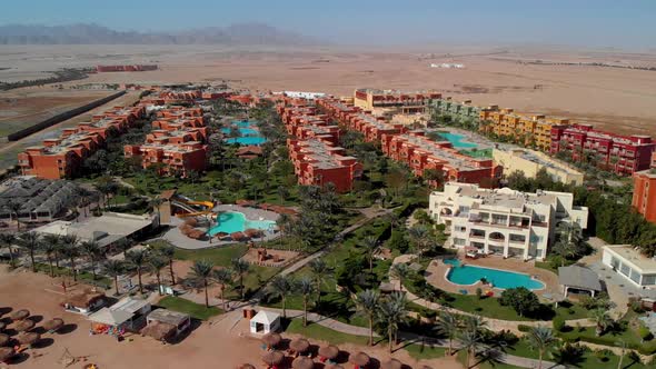 Flying from above over the hotel and the desert near Hurghada.