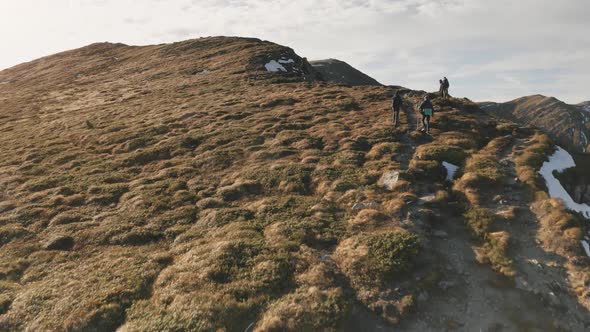 Tourist Hike to Mountain Top Aerial