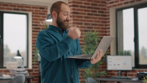 Happy Man Enjoying Satisfaction After Reading Good News