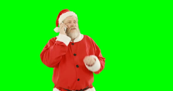 Santa claus talking on mobile phone