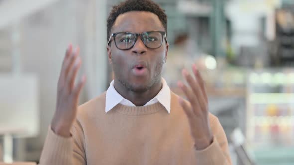 Creative African Man Feeling Shocked Surprised