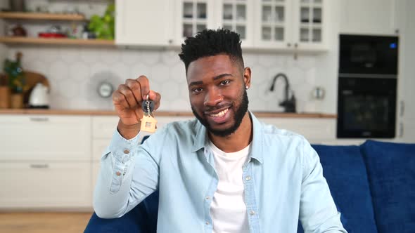 Excited Multiracial Guy Moving in New Home or Apartment