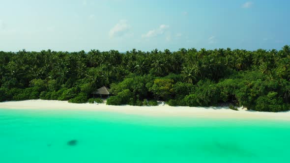Luxury overhead island view of a paradise sunny white sand beach and blue water background in colorf