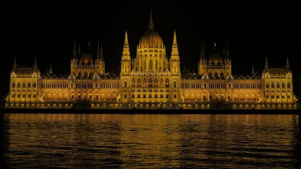 National Hungarian dome building by the night Budapest 4K 2160p 30fps UltraHD video - Parliament bui